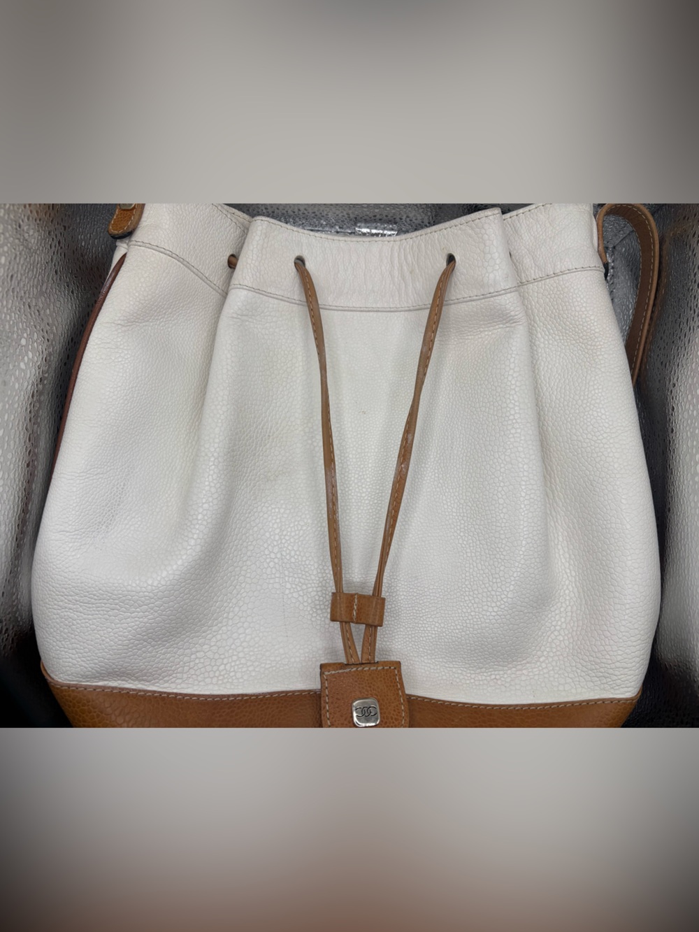 White and Tan Leather Drawstring Shoulder Bag